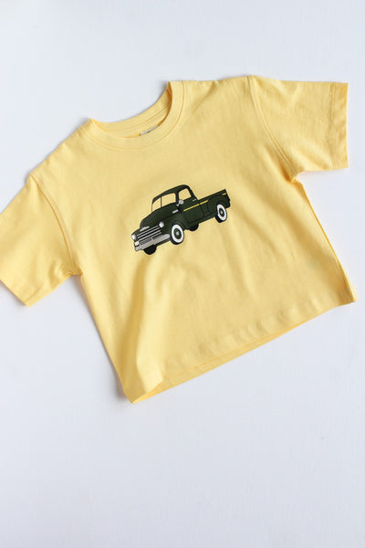 Yellow t-shirt with green chevy truck 