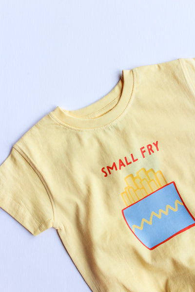 Yellow romper with 'Small Fry' text and French fry graphic on a white background