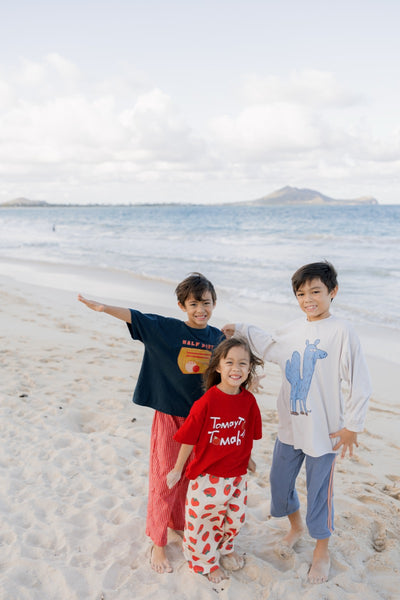 3 children wearing clothes from the august people store 