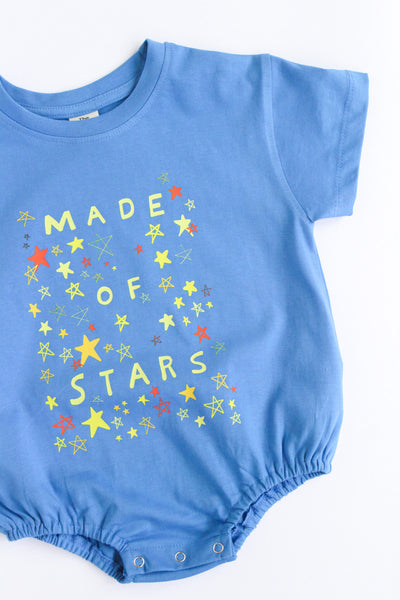 Blue baby romper with star design and text on a white background