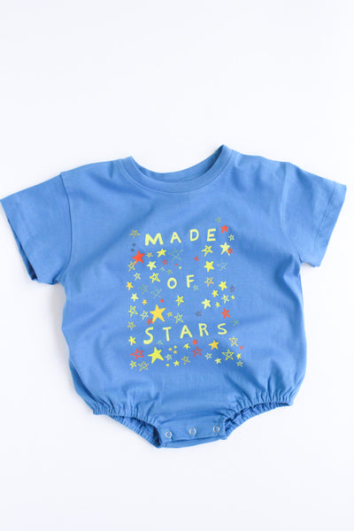 Baby retro blue romper with hand-drawn Made of Stars graphic and little stars