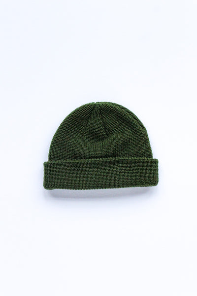 A green hat on a white background
