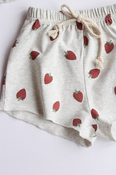 Heather grey shorts with red strawberry pattern on a white background