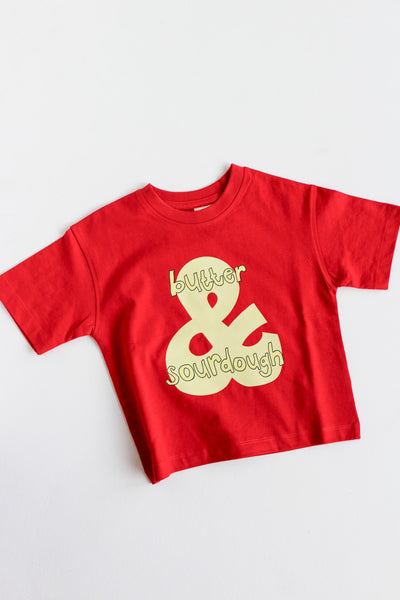 Red t-shirt with 'butter & sourdough' text on a white background